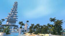 A tall rotation tower built on an oasis island.